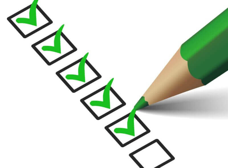 IT Audit Ticking boxes with a green pencil for IT Audit
