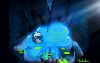 Man holding an IT cloud with managed IT services inside