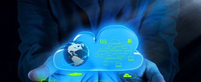 Man holding an IT cloud with managed IT services inside