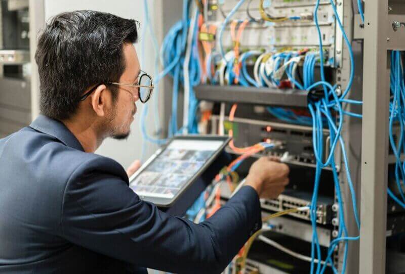 Microsoft-Server-in-a-Rack Microsoft Server in a Rack and a technician working